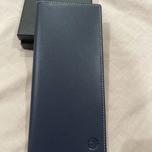 Leather travel document organizer.